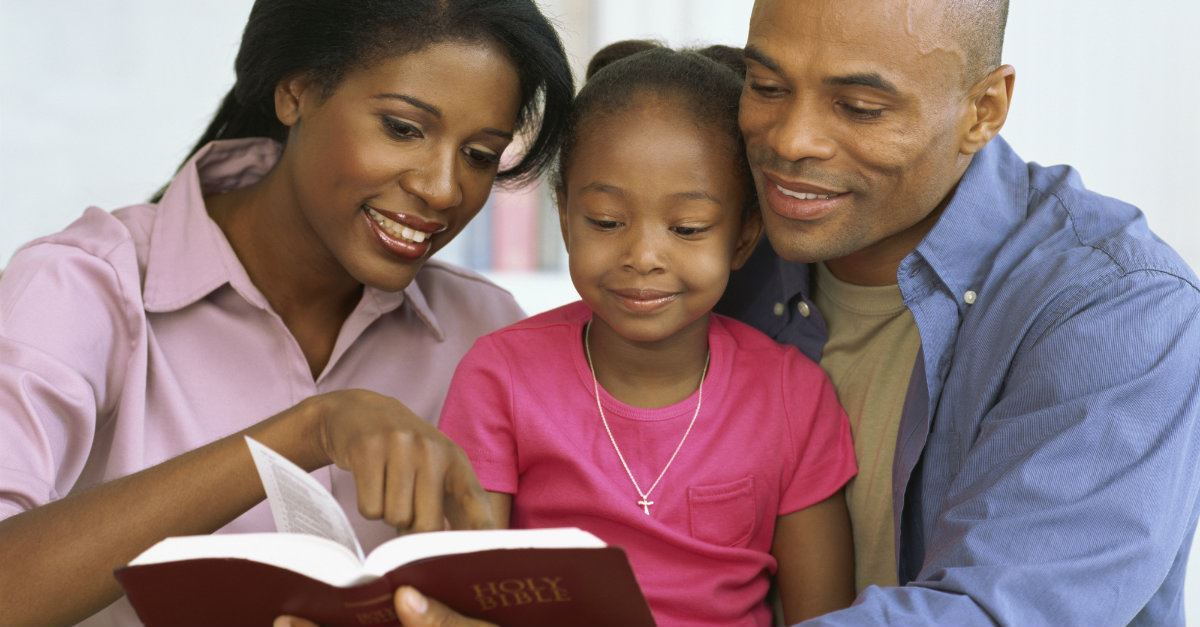 Family reading the Bible together